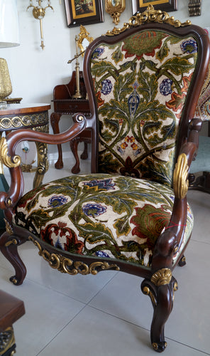 Hand carved High Back Armchair with exposed wood and Italian jacquard seat fabrics at Casabella Home Furnishings and Accessories Dubai.
