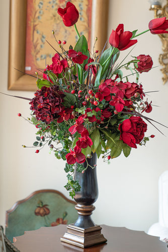Artificial flower arrangement with vase